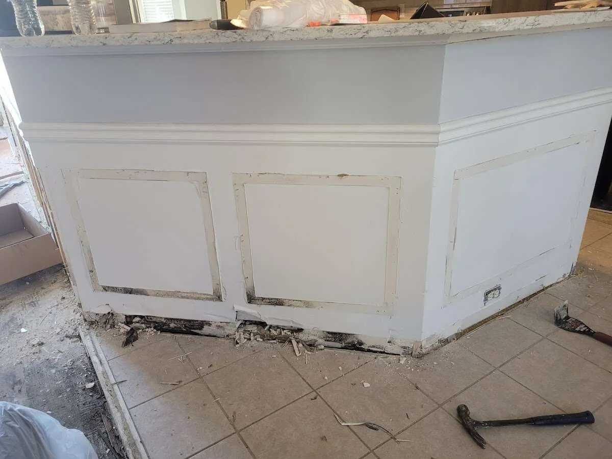 Water damage and mold on kitchen during Sewage Cleanup & Sanitation in Wilton Manors